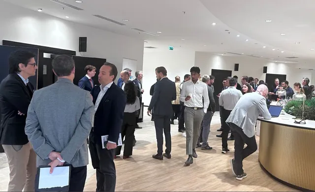 Networking in the atrium at AI in Finance Paris