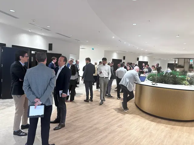 Practitioners speaking during the networking reception at AI in Finance Paris